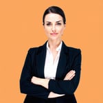 The HR manager exudes a sense of assurance and professionalism gazing directly into the camera with a steady selfassured expression With arms confidently crossed over their chest they convey both authority and approachability The backdrop features a-1